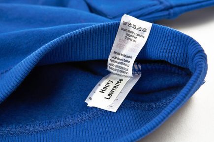 Apply Clothes Labels Onto Wash-Care Label - blue